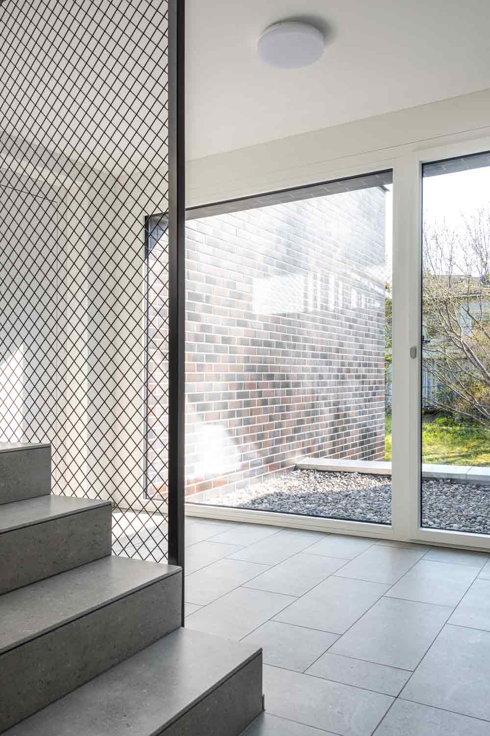 Innanansicht Treppenhaus MFH Panoramaweg, Baar. Fotografiert von Regine Giesecke Architecture Photography GmbH